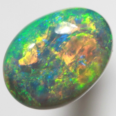SOLID SEMI BLACK OPAL Very bright orange and green in a 3D pattern SEE VIDEO